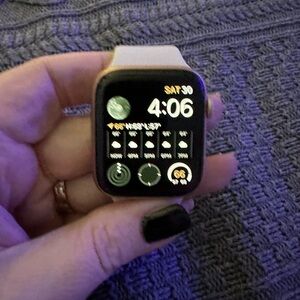 Apple Watch Series 5 44mm.  Used w/care some scratches from daily wear, new band